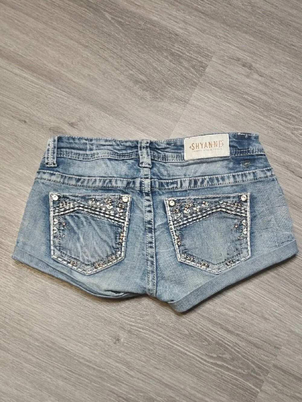 Light Wash Denim Short Shorts with Embellished Pockets